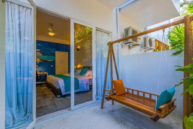 Boutique Beach Maldives Double Deluxe Bedroom Private Patio with Outdoor Swing