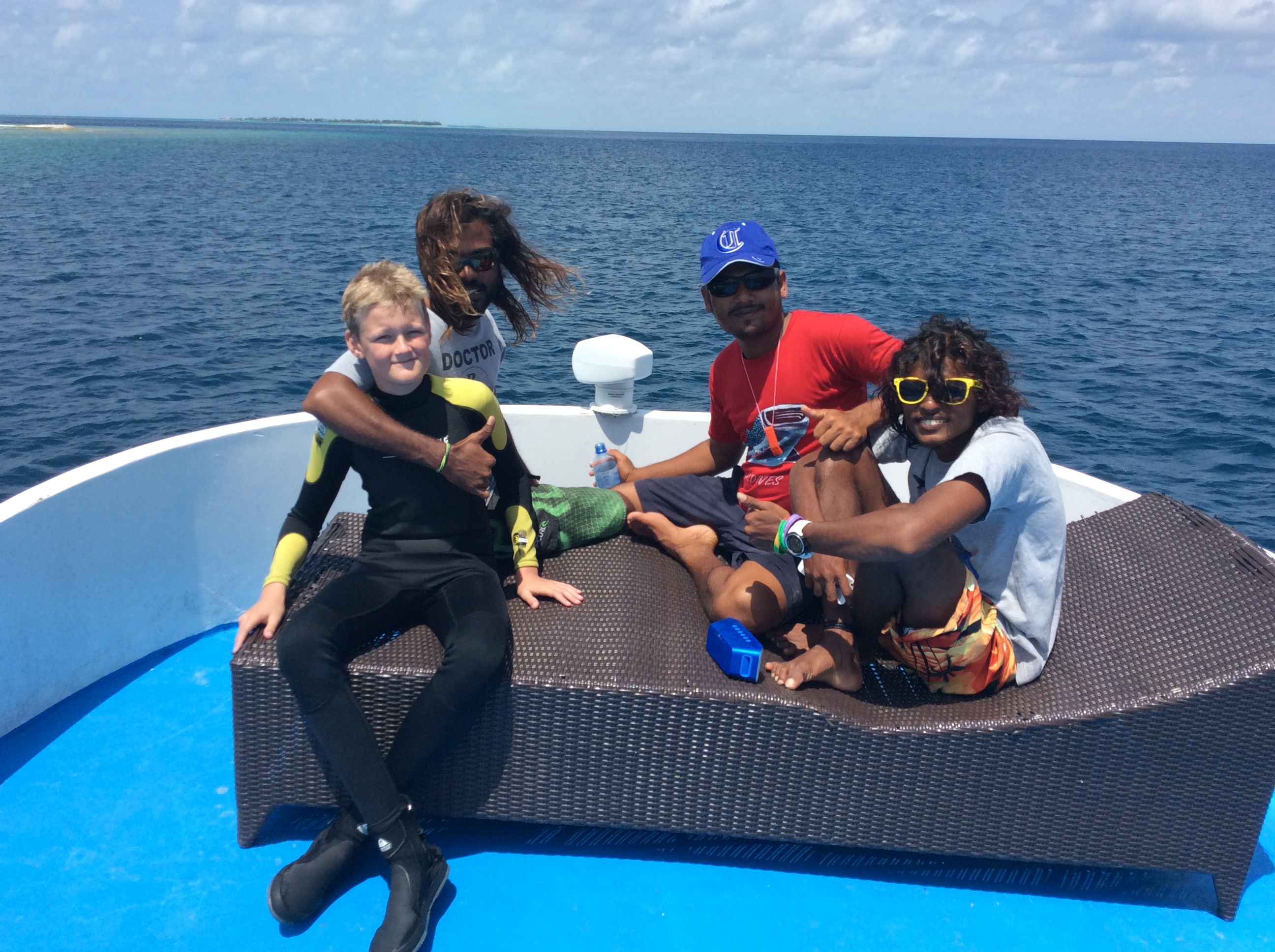 Boutique Beach Hotel Guests and Dive Instructors on the boat